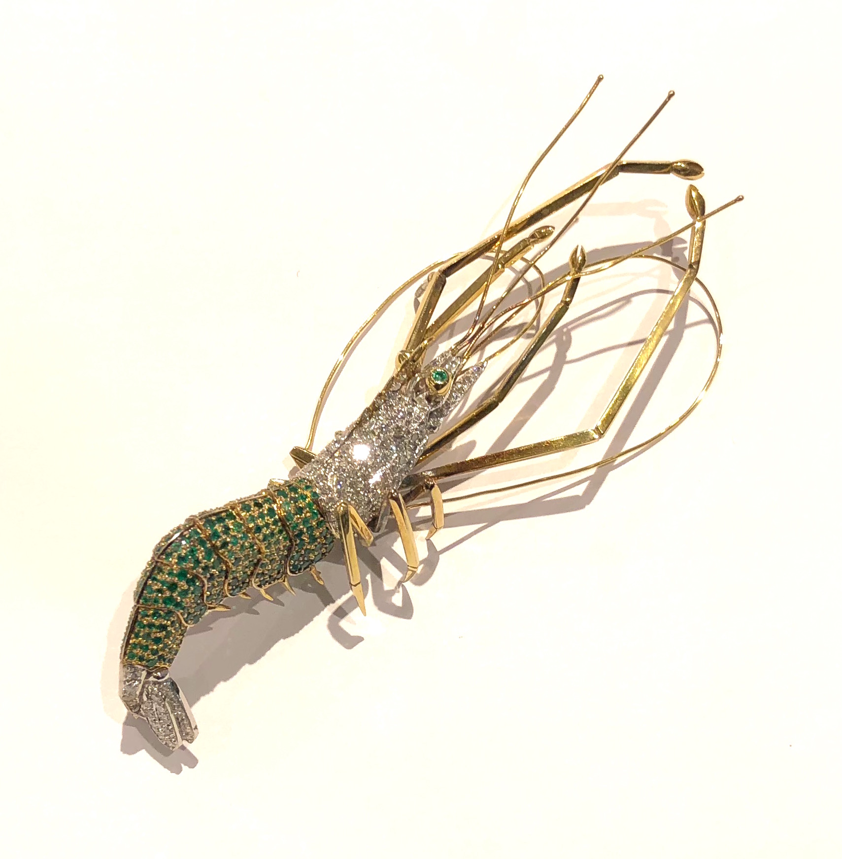 Jeweled and highly detailed “Shrimp” brooch, tsavorite garnets and diamonds pave set throughout the 14 white and yellow gold body, marked, c. 1980