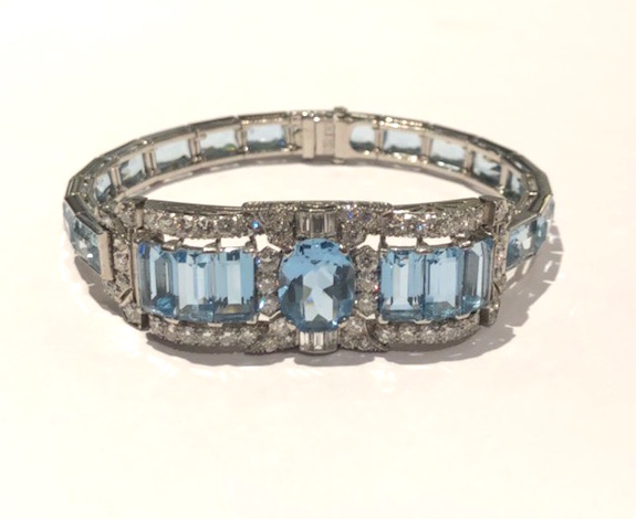 Waslikoff & Sons, Inc., New York (active 1920’s to 1950, 48th Street) Art Deco bracelet set with one large oval aquamarine, 6 large emerald-cut aquamarines and 16 French cut aquamarines (approx. 30 carats TW for the 23 aquamarines) together with 60 round-cut diamonds and 6 baguette diamonds (approx. 6 carats TW for the 66 diamonds) all set in platinum, signed, c. 1930’s