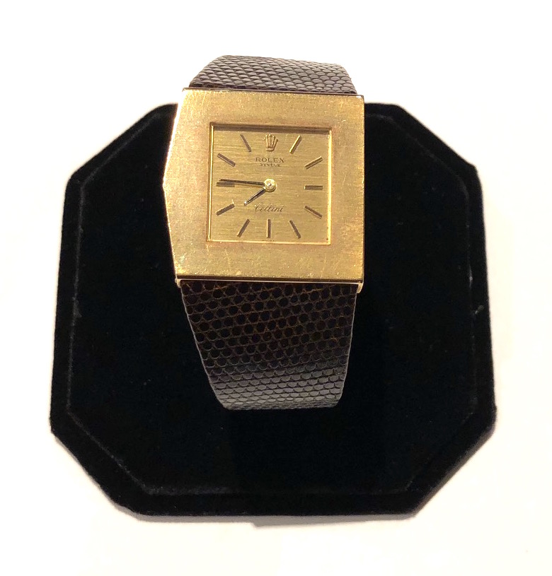 Rolex Cellini “King Midas” model #4017, 18k yellow gold wristwatch with an asymmetric design, housing an 18 jewel manual wind movement, original exotic leather strap with 18k yellow gold Rolex buckle, signed, c.1970’s