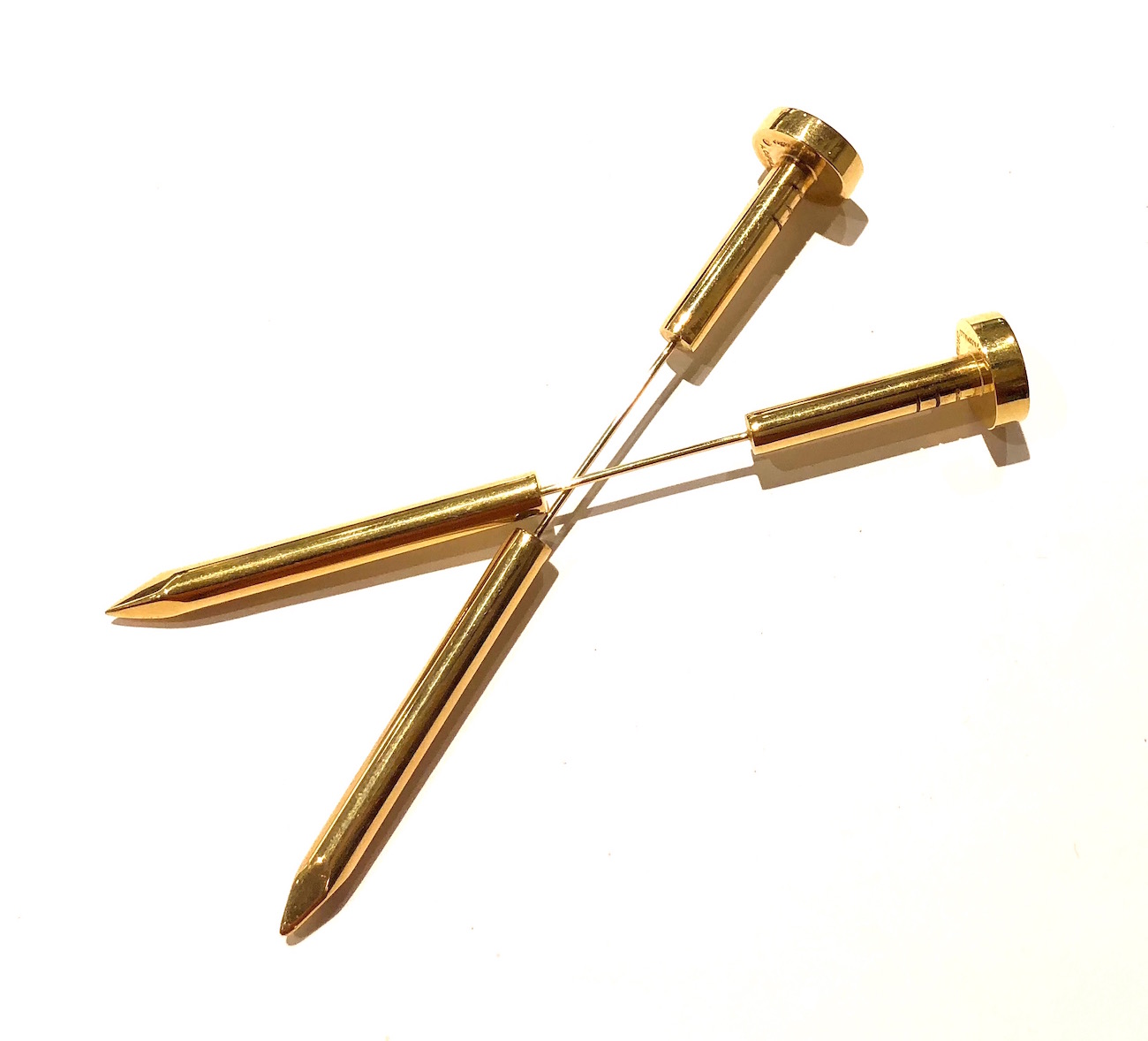 Aldo Cipullo for Cartier “Juste un Clou” or “Nail” brooches in 18K yellow gold, signed, 1971
