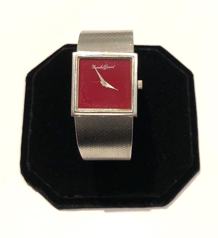 Bueche Girod 18k white gold square face wrist watch with a crimson red watch face and an extremely fine woven 18k white gold band and clasp, signed, c.1970