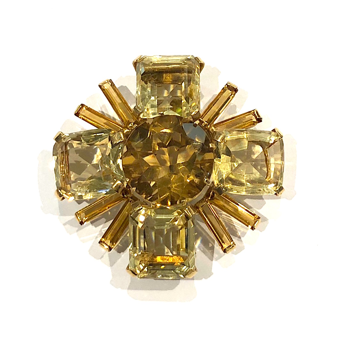 Seaman Schepps, New York  “Maltese Cross” brooch, one large round cut central citrine (approx. 45 carats) set with 4 large square step-cut citrines (approx. 108 carats TW) and further set with four extra long baguette citrines (approx. 13 carats TW) in a radiating pattern set in 14k yellow gold (total citrine carat weight of 166 carats), signed: Seaman Schepps, 14k, c. 1940’s