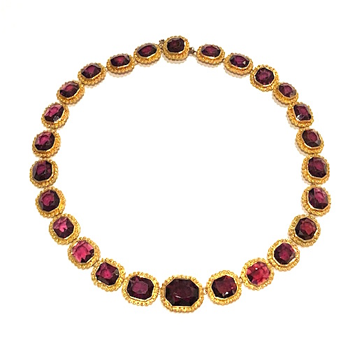 British late 19th Century classic “Riviere” necklace set with 26 gem quality almandine garnets (approx. 72 carats TW) all set in Byzantine Revival style fancy 18k gold bezels embellished with delicate ball and twisted gold wire details (or also known as Cannetille work, that became popular towards the end of the Georgian period) completely encircling each of the 26 almandine garnets, c. 1880’s