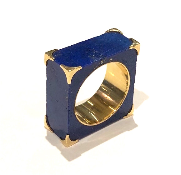 Tiffany & Co., Paris, / Georland, Paris, (Georges Richard and Roland Bouder) solid squared block of lapis lazuli in the shape of a ring and mounted in all eight corners and on the interior of the ring hole in 18k yellow gold, signed: Tiffany France 18k, Ste and a G with a Cornucopia between in a diamond poincon (maker’s mark for Georland), French Eagle’s head assay mark for 18k gold, pre-1952 (when Tiffany & Co. closed their Paris store)