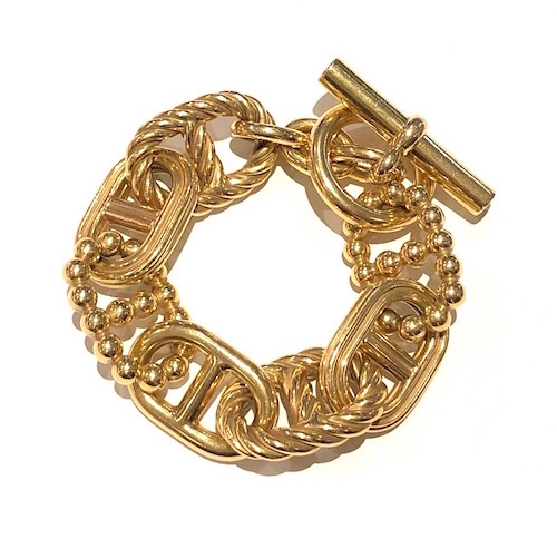 Hermes, Paris, designed by Jean Paul Gaultier (born 1952) as a Special Order 18k yellow gold large scale multiple link bracelet, signed: HERMES, AU, 750, no.084171, “S” (special order), CO and a lion head touchmark all in a diamond cartouche (likely the maker’s mark of Claude Ovalde, 7 rue des Gravilliers, 75003, Paris), French Eagle’s head touch mark for 18k gold, early 2000’s