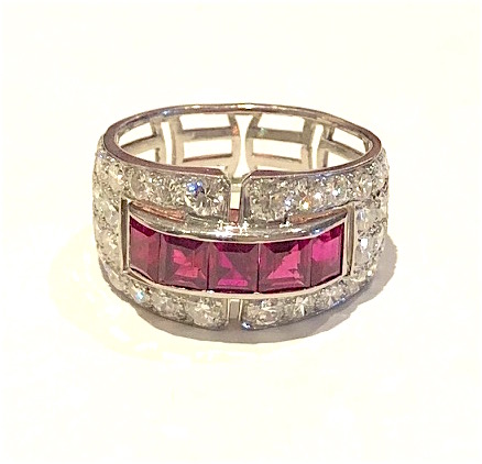 Art Deco ruby and diamond ring set with 5 square-cut natural rubies (approx. 3 carats TW) and further set with 44 round diamonds (approx. 2.50 carats TW) all set in a geometric cut-out design throughout, c.1930
