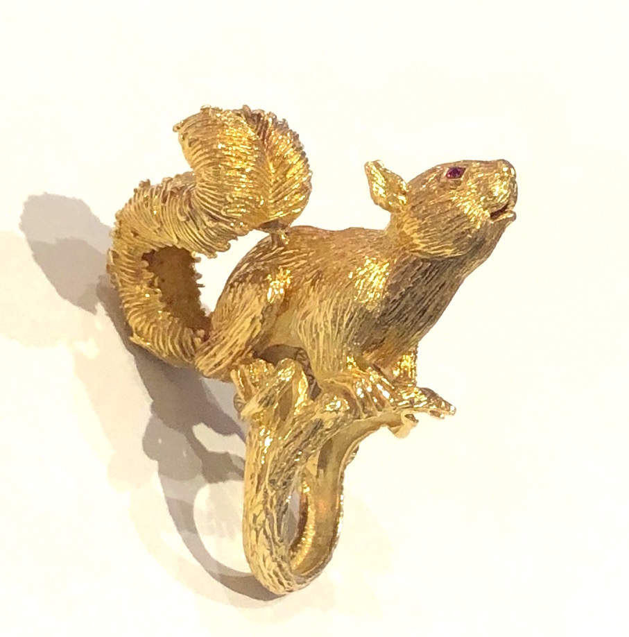 Kurt Wayne (born in Vienna, 1909-1990, New York) statement “Squirrel” ring in highly textured 18k gold and set with ruby eyes, signed: (Copyright mark) KW 1969, KW 18k, 1969