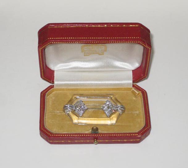 Cartier Art Deco brooch, carved rock crystal with a fancy platinum mount set with diamonds, original leather box, signed c. 1925