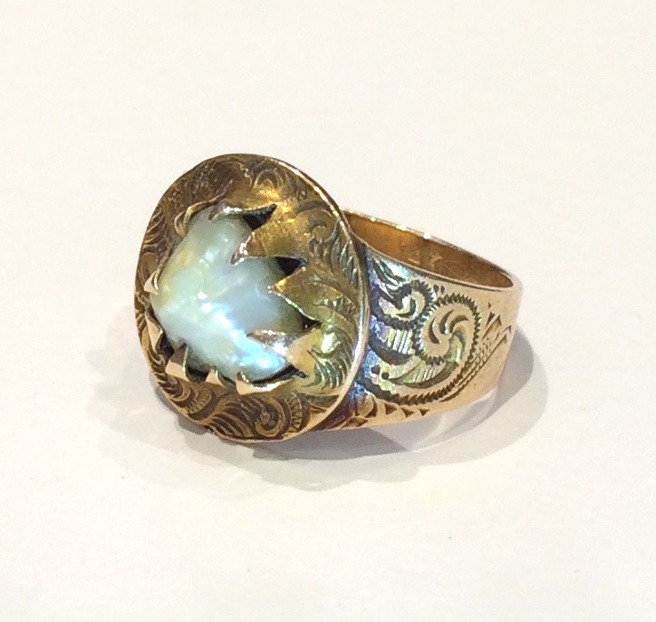 American Arts & Crafts ring, 14K gold with repousse details and a claw mounted natural blister pearl, marked, c. 1915