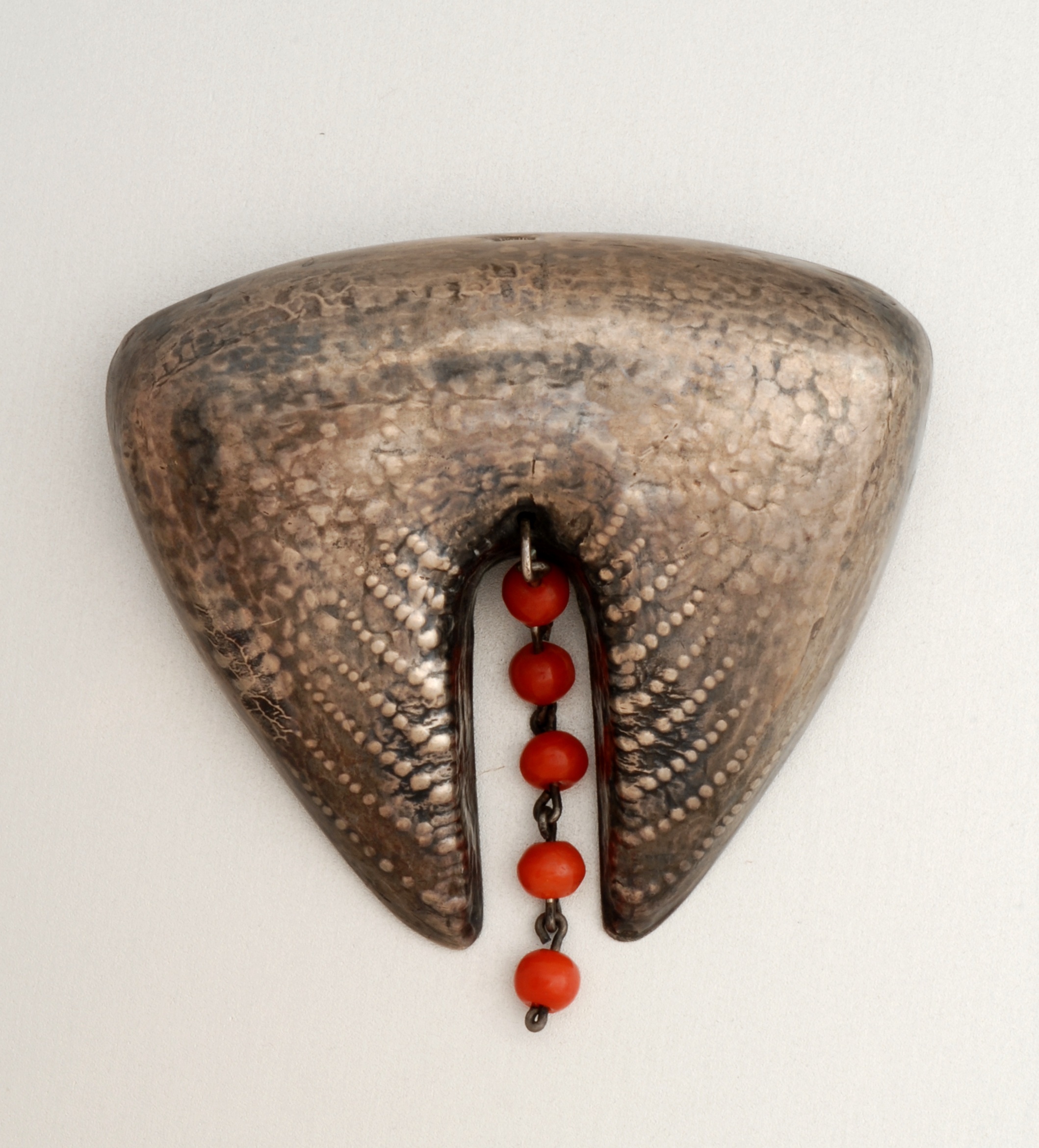Fons Reggers (attr.) / Amsterdam School “Expressionistic” silver and red coral brooch, marks, c. 1923-34